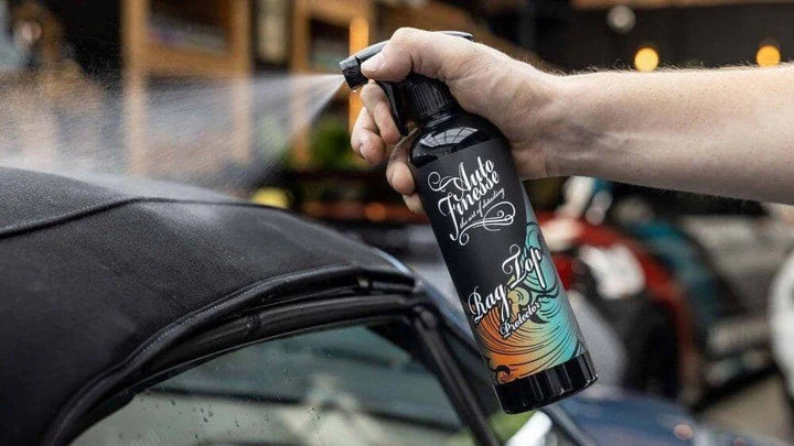 convertible fabric roof protected from water and dirt using rag top protector