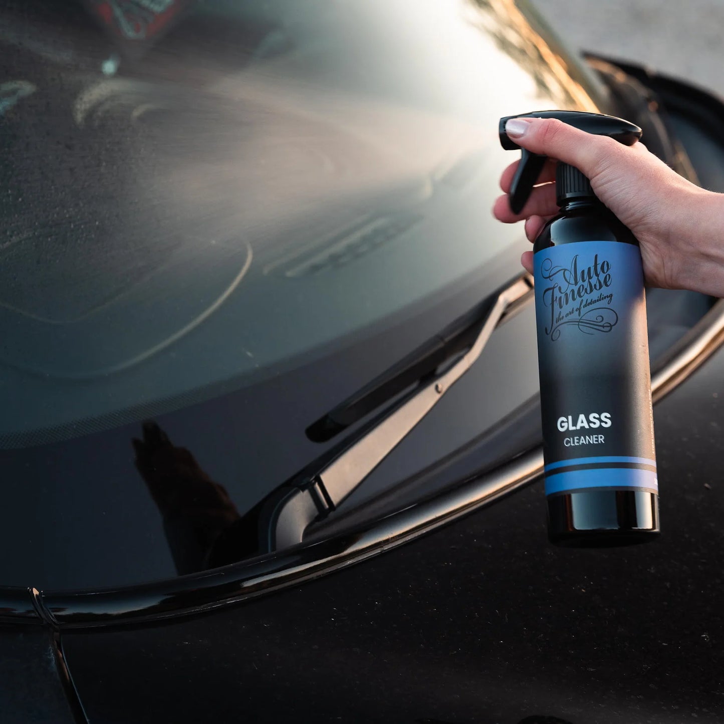 car window being cleaned with auto finesse glass cleaner spray 